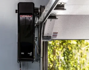 Close-up of a wall-mounted LiftMaster garage door opener with a battery backup system